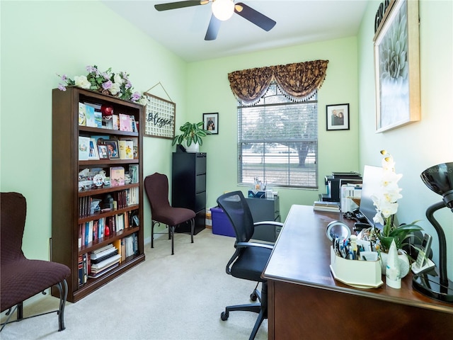 carpeted office with ceiling fan