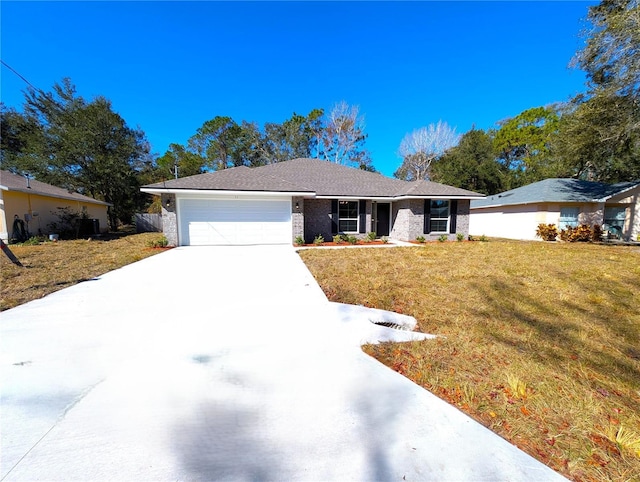 single story home with a garage and a front yard