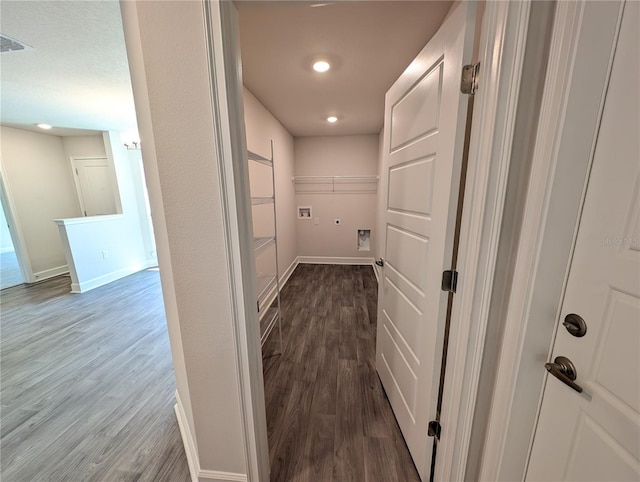 corridor with dark wood-type flooring