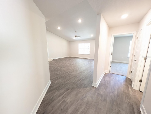 hallway with dark hardwood / wood-style floors