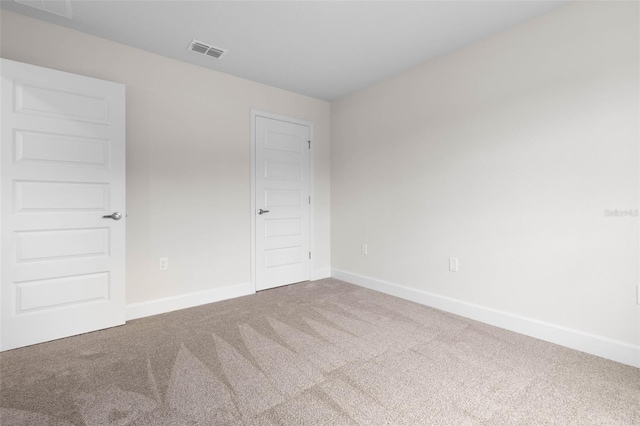 15 Serene Pl, Palm Coast, FL 32164 - carpeted empty room with baseboards