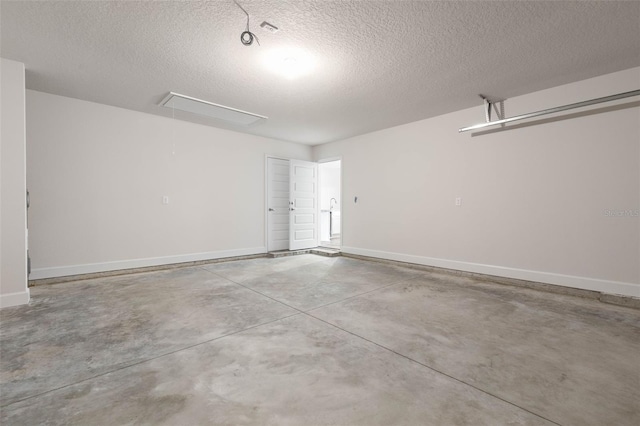 15 Serene Pl, Palm Coast, FL 32164 - garage featuring baseboards