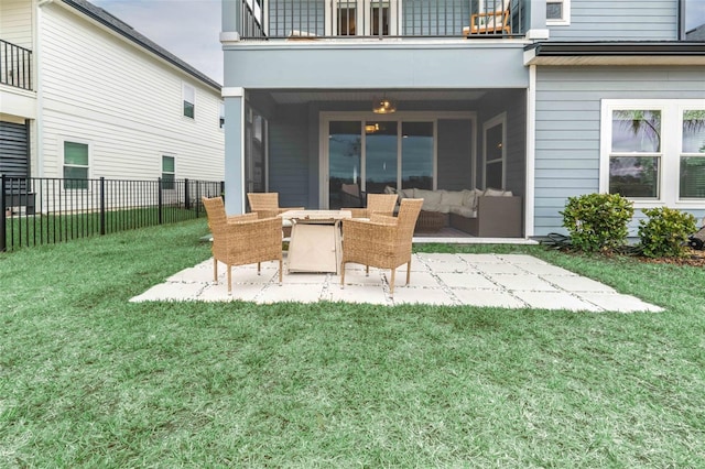 view of patio / terrace featuring an outdoor hangout area, a balcony, and fence