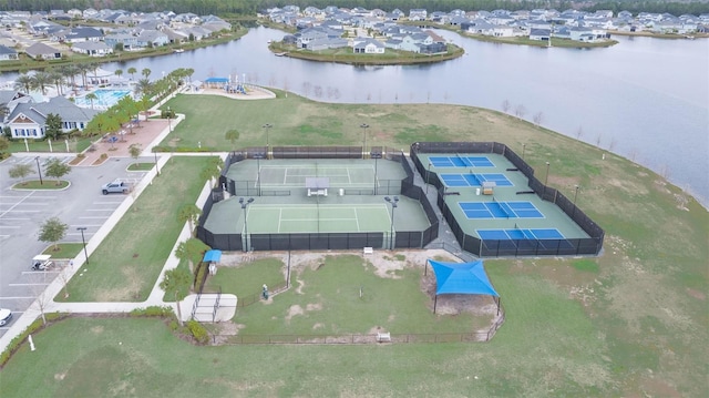 aerial view with a residential view and a water view