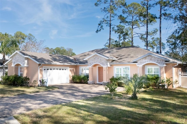 single story home with a garage and a front yard