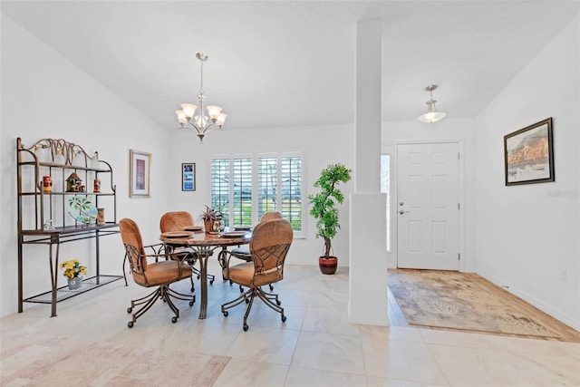 dining area with an inviting chandelier, lofted ceiling, and light tile patterned floors