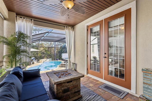 exterior space featuring wooden ceiling and ceiling fan