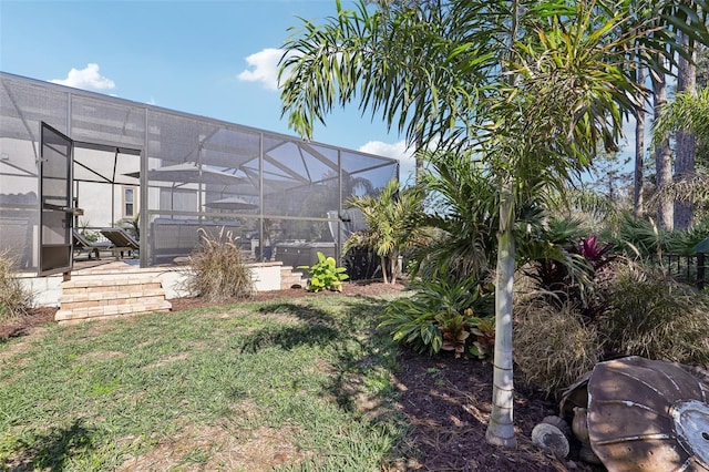 view of yard featuring a lanai