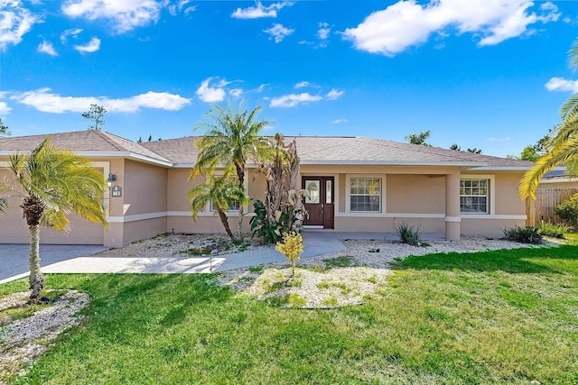 single story home with a front lawn