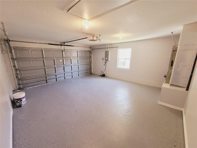 garage featuring a garage door opener and electric panel