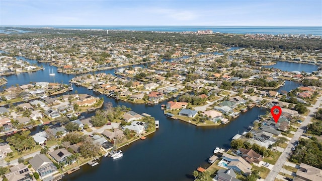 drone / aerial view featuring a water view