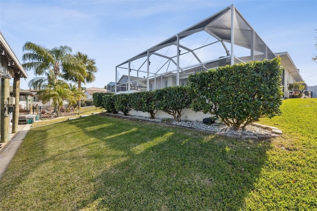 view of yard with a lanai