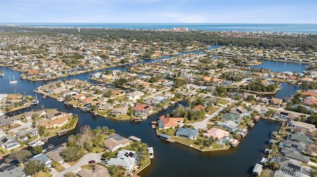 drone / aerial view featuring a water view