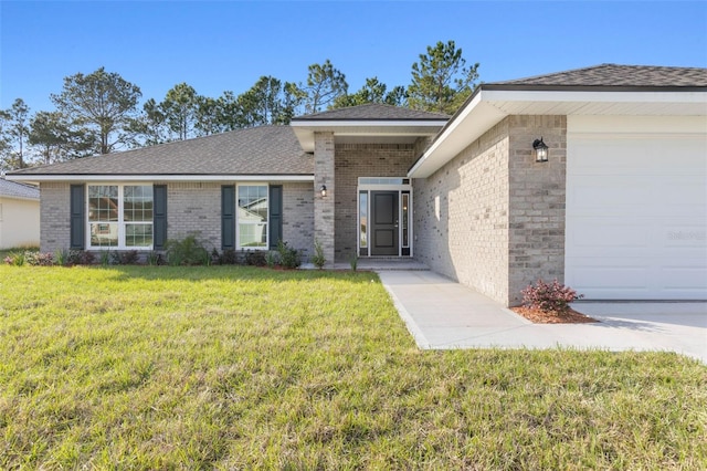 ranch-style home with a garage and a front yard