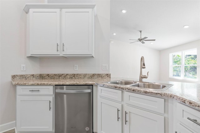 kitchen with sink, white cabinets, stainless steel dishwasher, ceiling fan, and kitchen peninsula