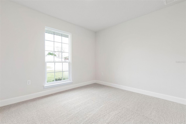 empty room featuring carpet flooring