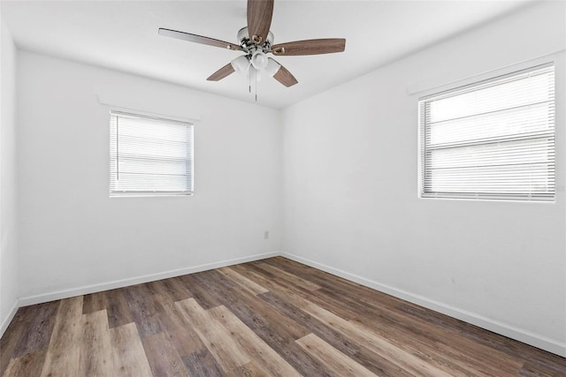 unfurnished room featuring hardwood / wood-style floors and ceiling fan