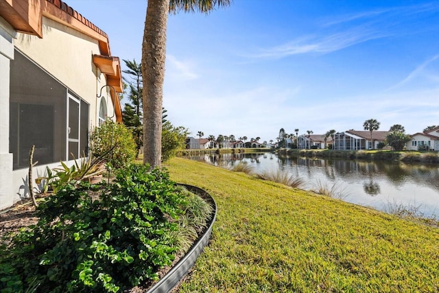 view of yard with a water view