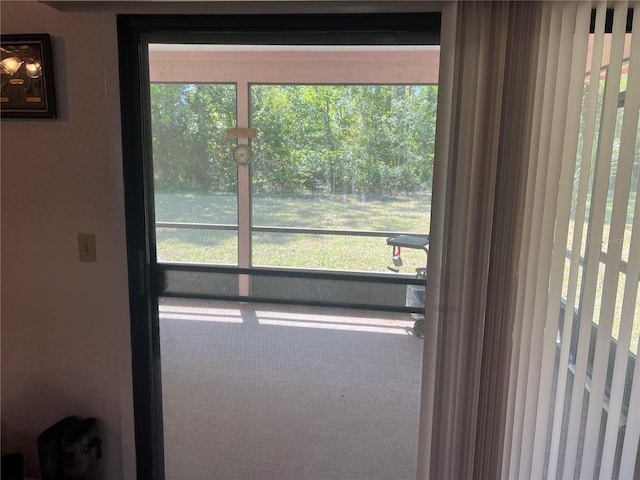 interior space with carpet flooring and a wealth of natural light