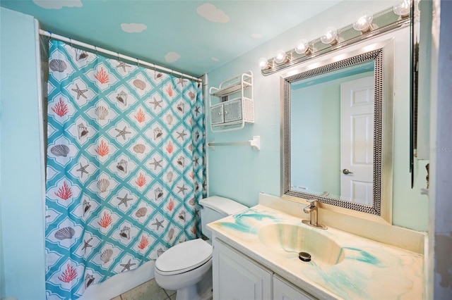 bathroom featuring vanity, toilet, and walk in shower