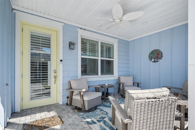 view of patio featuring ceiling fan