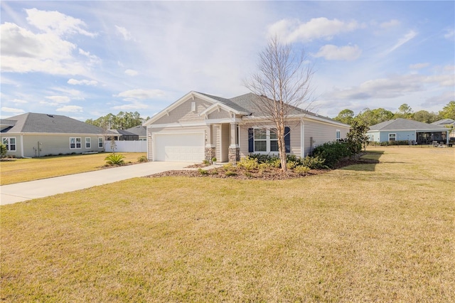 view of front facade with a garage and a front yard