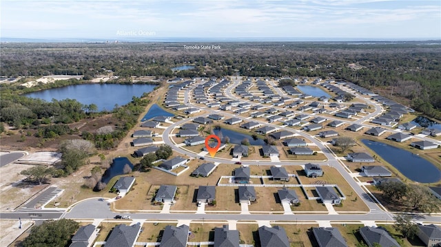 aerial view with a water view and a residential view