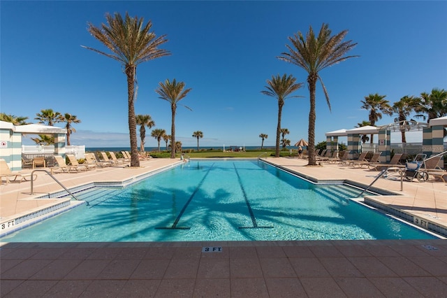 view of pool featuring a patio