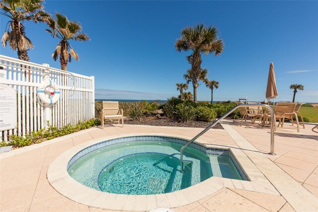 view of pool with a mountain view and a patio area