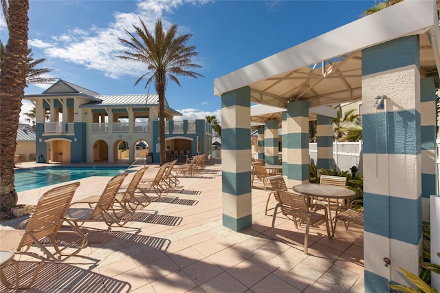 view of patio / terrace featuring a community pool