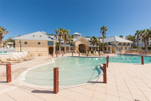 view of swimming pool with a patio