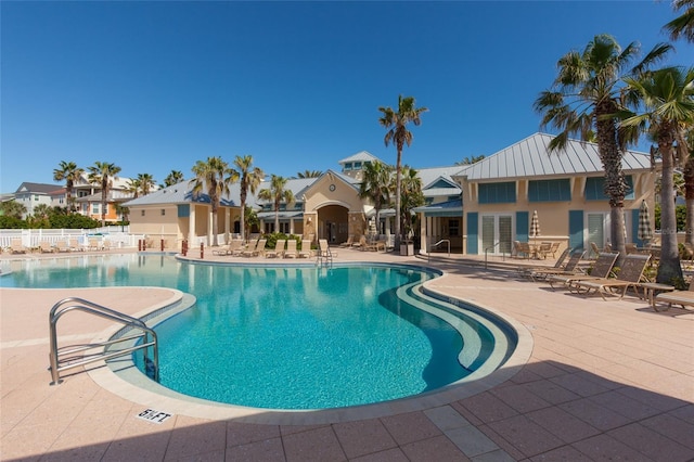 view of swimming pool featuring a patio area