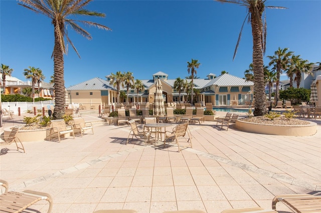 view of patio with a community pool