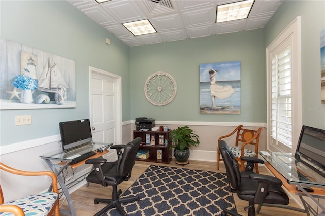 office area with light hardwood / wood-style floors