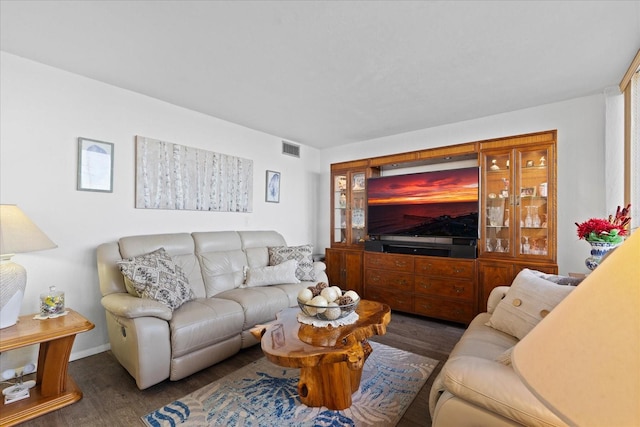 living room with dark hardwood / wood-style floors