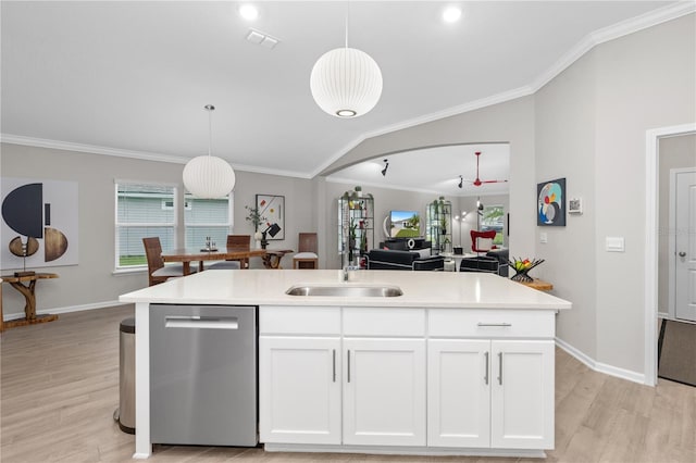 kitchen featuring dishwasher, white cabinets, and an island with sink