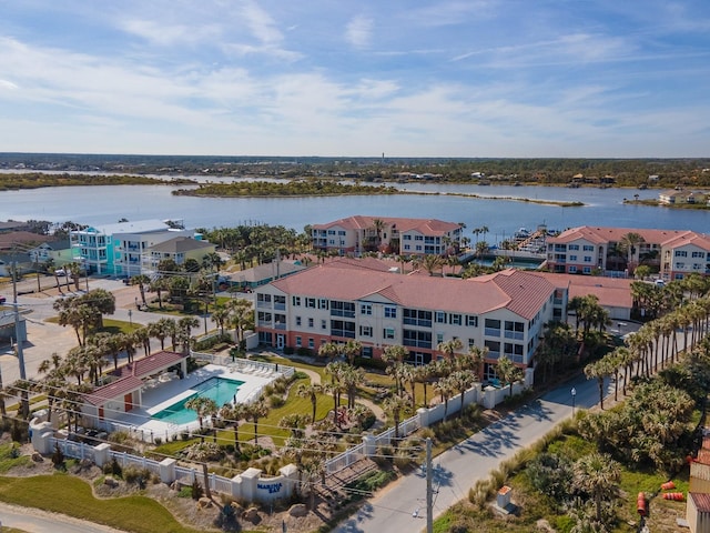 birds eye view of property featuring a water view