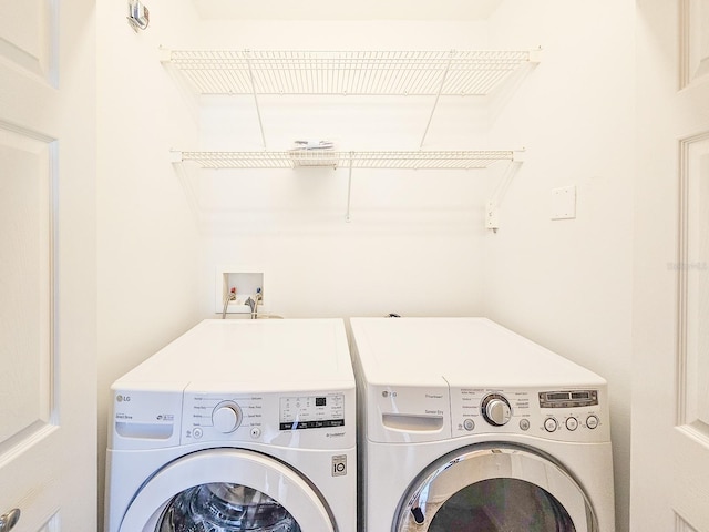 laundry area with washer and dryer