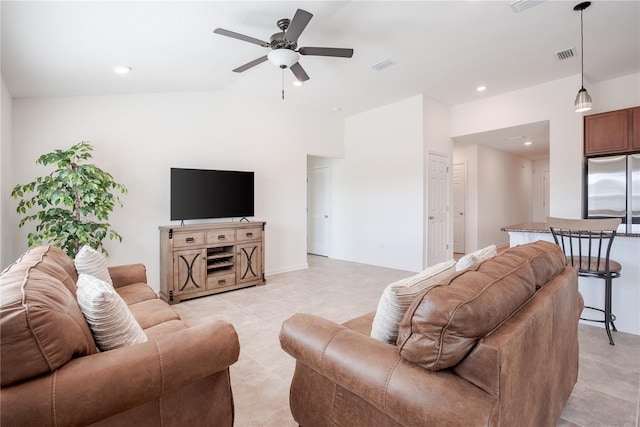 living room featuring lofted ceiling and ceiling fan