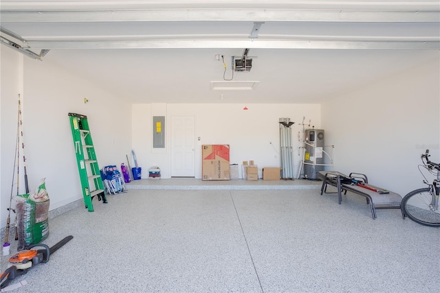 garage featuring a garage door opener, electric panel, and water heater