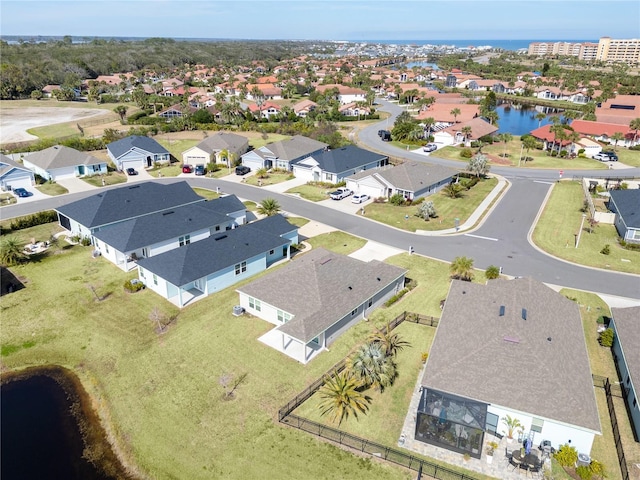 drone / aerial view with a water view