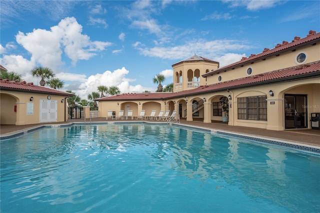 view of pool featuring a patio area