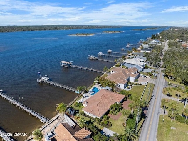 birds eye view of property featuring a water view