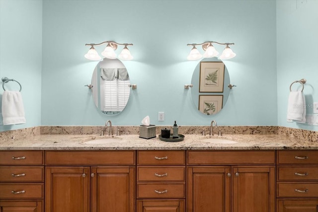 bathroom featuring double vanity and a sink