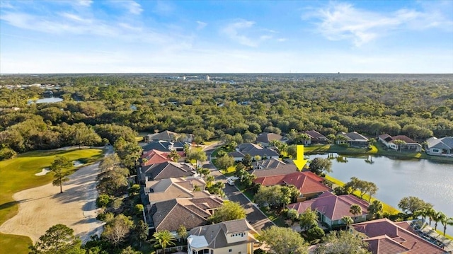 birds eye view of property with a residential view, a water view, and a forest view