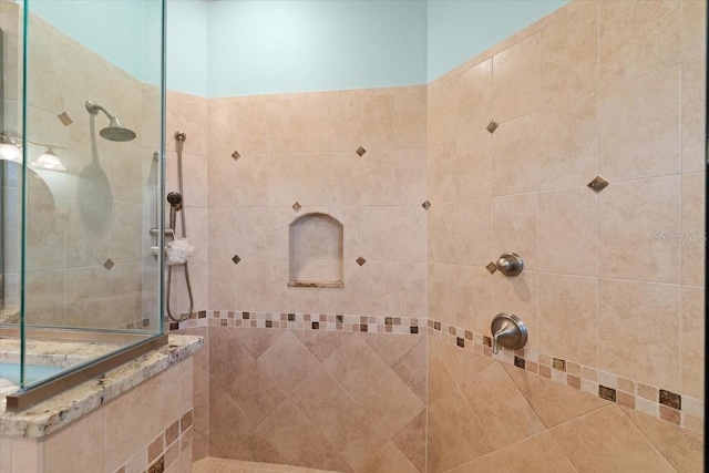 full bathroom featuring a walk in shower