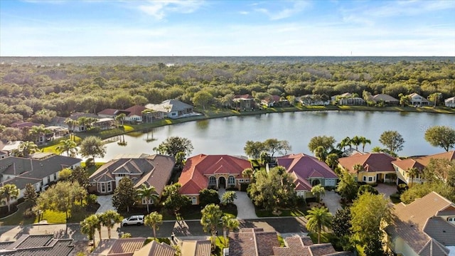 bird's eye view with a water view and a residential view