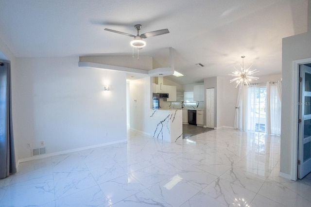 unfurnished living room featuring lofted ceiling, sink, and ceiling fan with notable chandelier