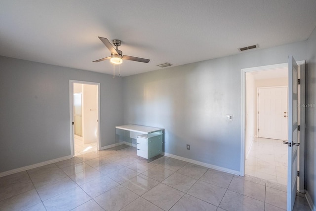 unfurnished room featuring ceiling fan