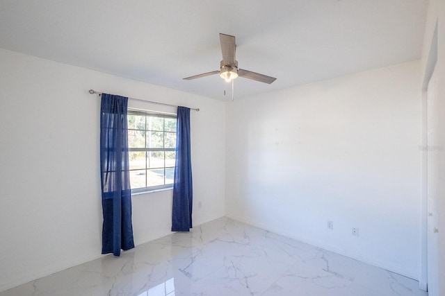 empty room featuring ceiling fan